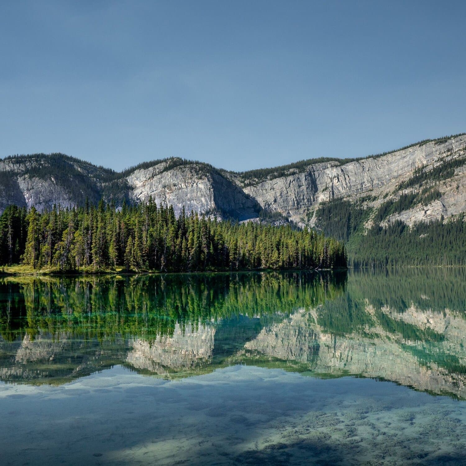 Mountain lake landscape representing environmental stewardship